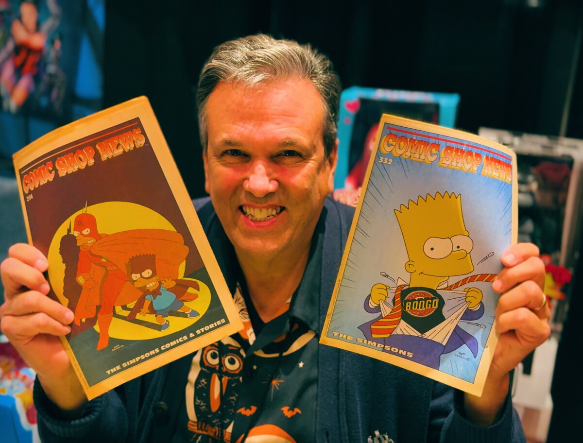 Bill Morrison reading an issue of Comic Shop News